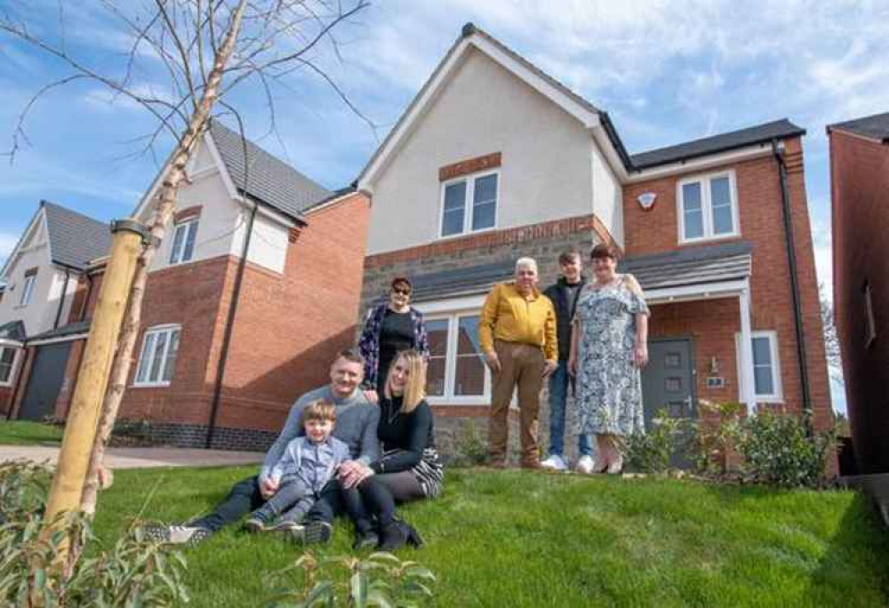 The whole family get together on the front lawn in Hugglescote