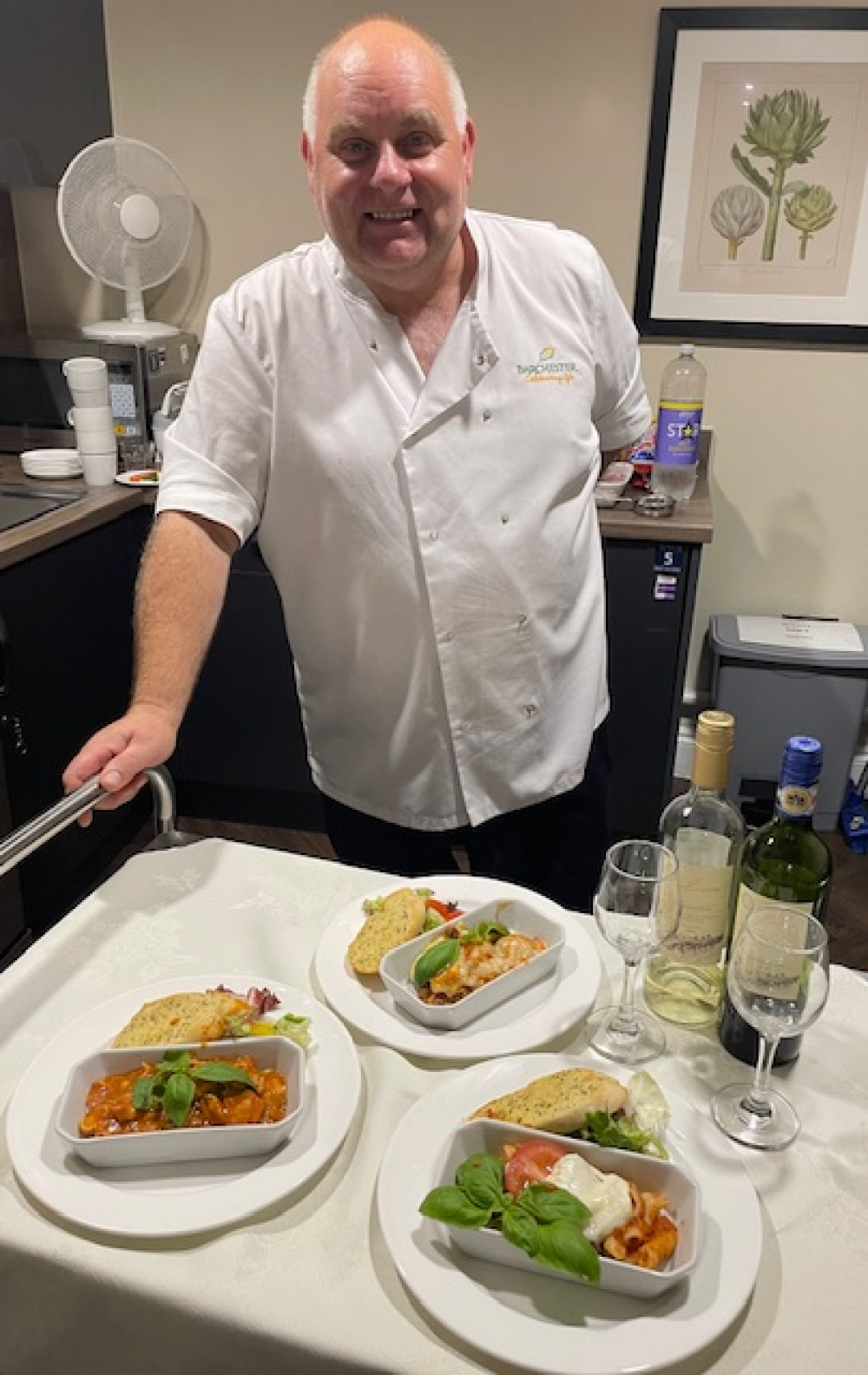 Crandon Springs Care Home Head Chef, Simon, prepares to serve residents with a variety of Italian dishes during the home’s Italian themed dining experience.