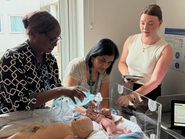 Neonatal Consultant Dr Charu Bhatia demonstrates intubation, the insertion of a breathing tube, on the simulator. 