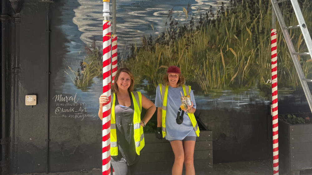 Alice and Katie of A&K Art are working on the a new mural in the heart of Richmond (credit: Image supplied).