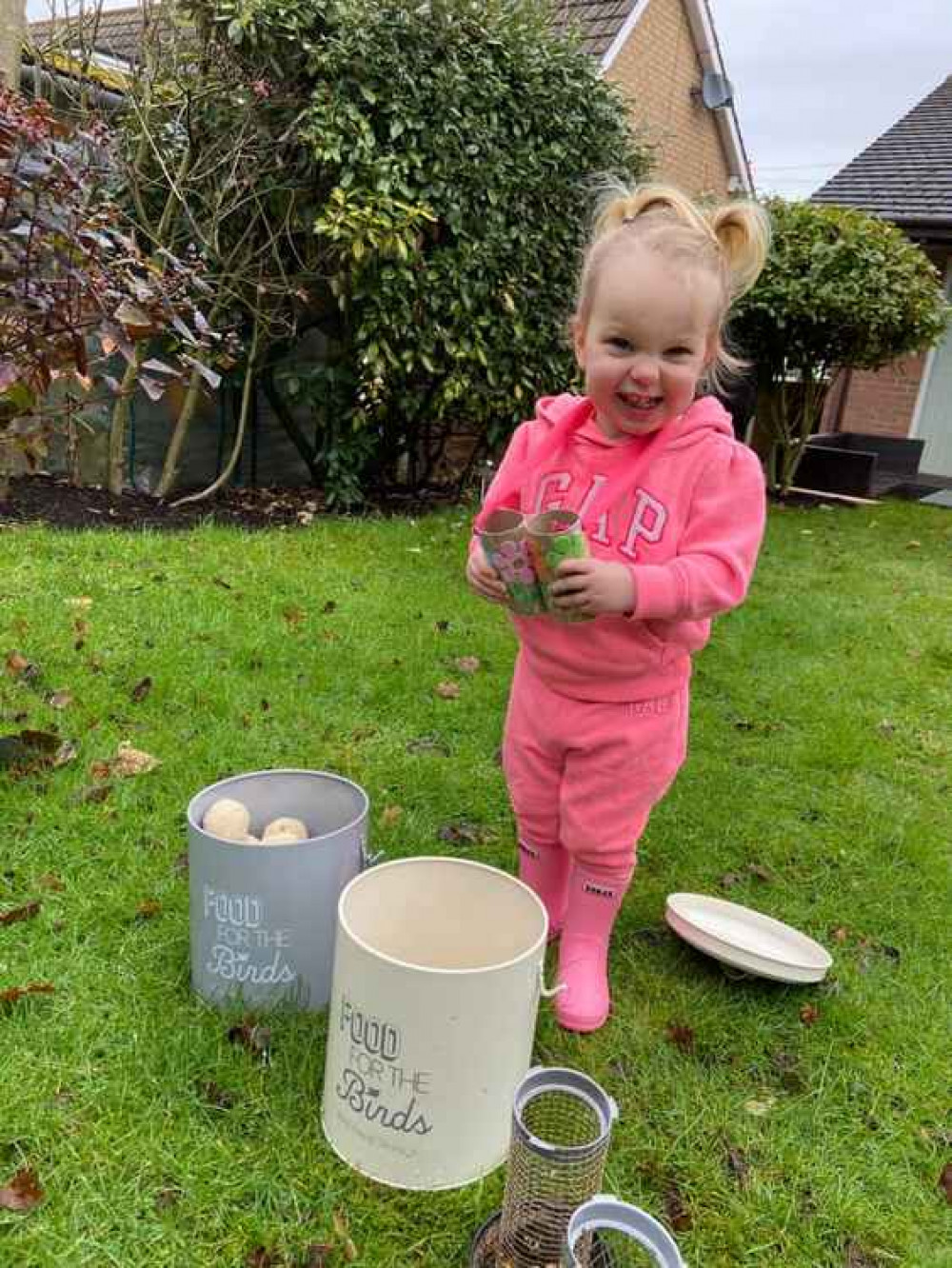 Evie aged 21 months with her homemade binoculars looking for the birdies (Image by Ruth Burgess)