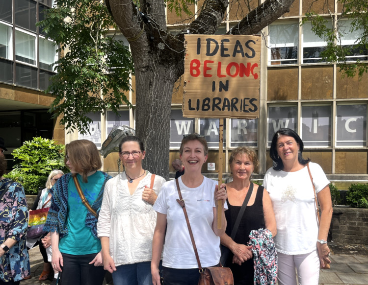 Author Heide Goody (centre) urges Warwickshire politicians to let librarians work freely amid controversy over Pride display (image via Nub News) 