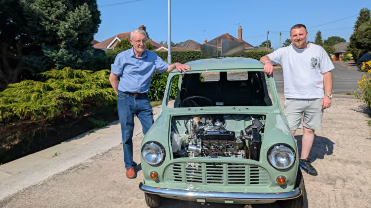 Sandbach's Tom Coles (right) with his grandad, John Barron, and the 1982 van they are restoring. (Photo: Nub News) 