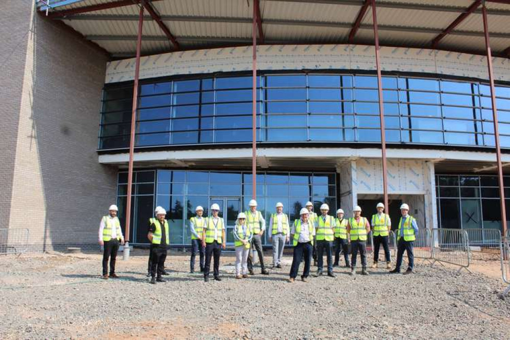 Dignitaries from NWLDC are joined by staff from Metnor and Everyone Active outside the impressive Whitwick and Coalville Leisure Centre