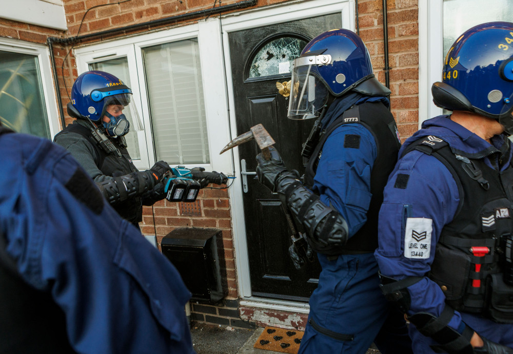 Eight men have been charged following raids in Wythenshawe on Thursday, July 9 (Credit: GMP)