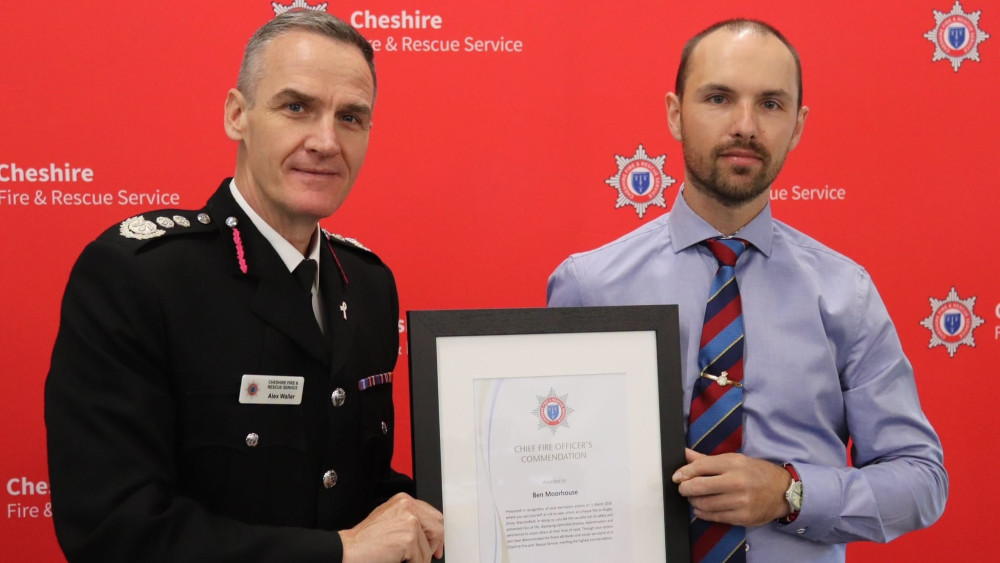 Chief Fire Officer Alex Waller presents Ben Moorhouse with a Commendation (Credit: CFRS)