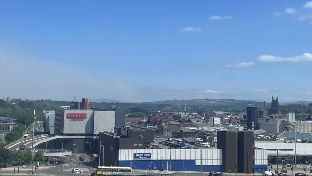 Smoke seen in the background pouring into Stockport and Greater Manchester from nearby fires (Image - Nub News)