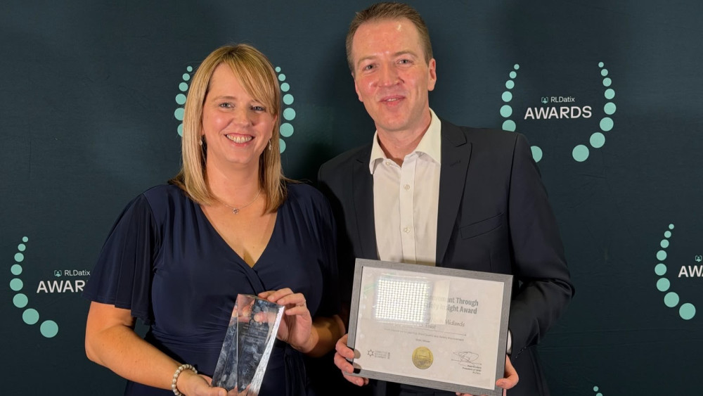 Gemma Wyse and Joe Potts receive the award (image via UHNM)