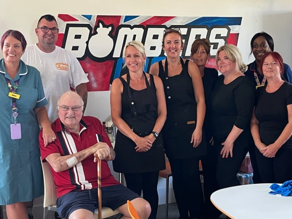 Healthcare Assistant Donna Salmons (left), with, from left, patients Daniel Greene and Malcom Bigg and Bombers staff members including Lauren, Gina, Gemma and Tina. At the back right is Day Unite manager Gillian Ives.