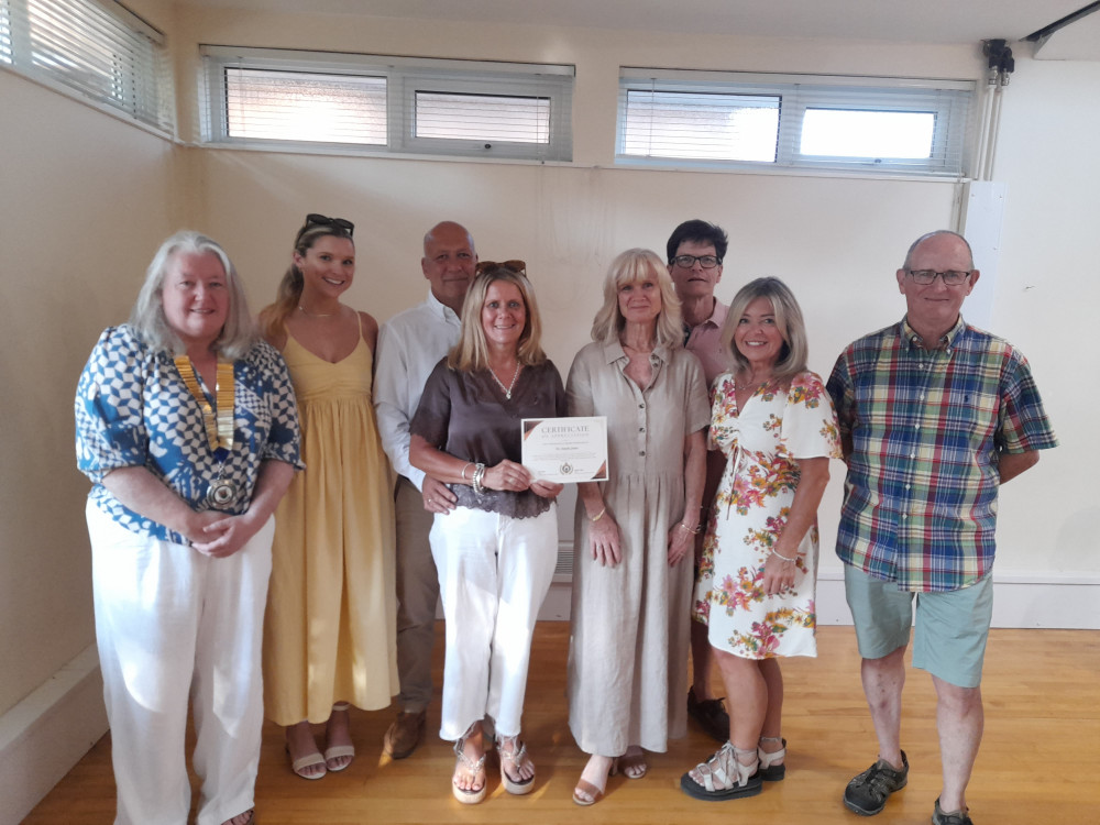 Here's Council Chair Debbie Evans left and Jon Cowpe right with the family of Dr Jones.