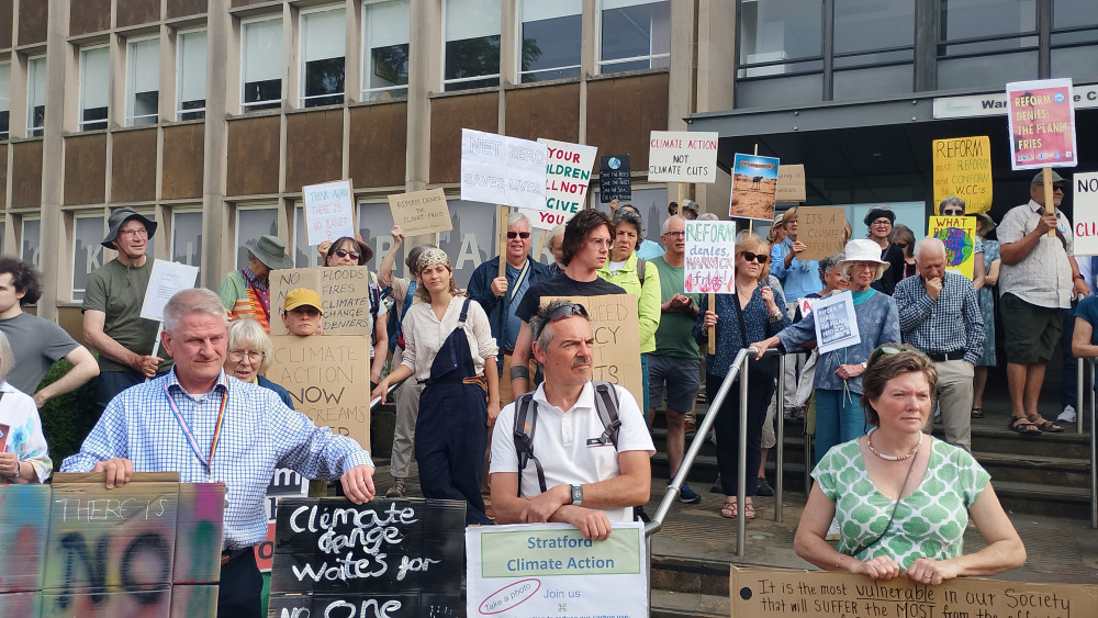 Around 80 protested in Warwick against Reform UK's motion to reverse a 2019 climate emergency declaration. (image supplied)