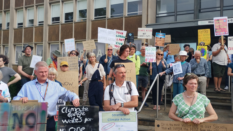 Around 80 protested in Warwick against Reform UK's motion to reverse a 2019 climate emergency declaration. (image supplied)
