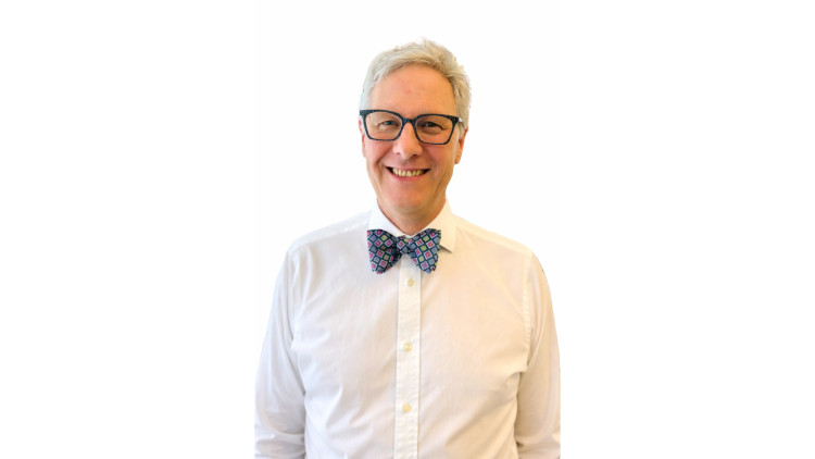 Christopher Young, nearly 40 years in optics, values technology but prioritizes time, trust, and personal care. His Shepton Mallet practice emphasizes personalized care, adapting to modern challenges like screen-induced myopia.