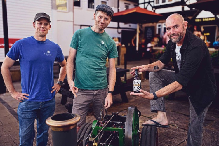 Traction Cider owners, Dave and Will, with Co-owner of Applestump Records, Steve Cook (Photo: Angela Murton).