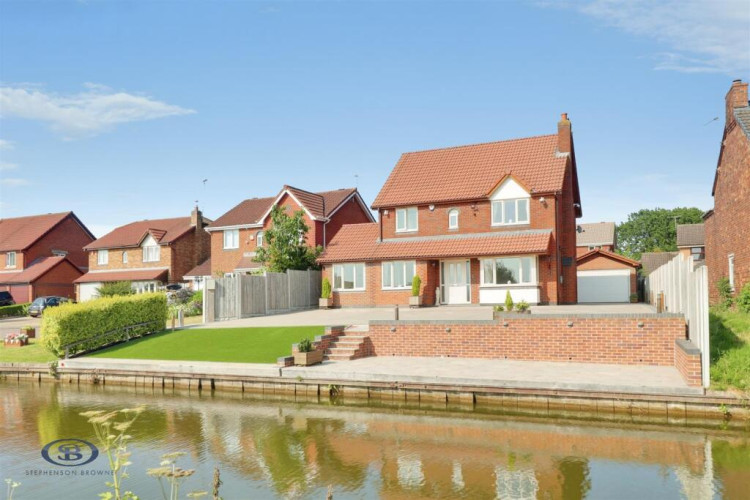 Check out this stunning canal-side four bedroom executive detached family home occupying a prime cul-de-sac position.  (Photo: Stephenson Browne)