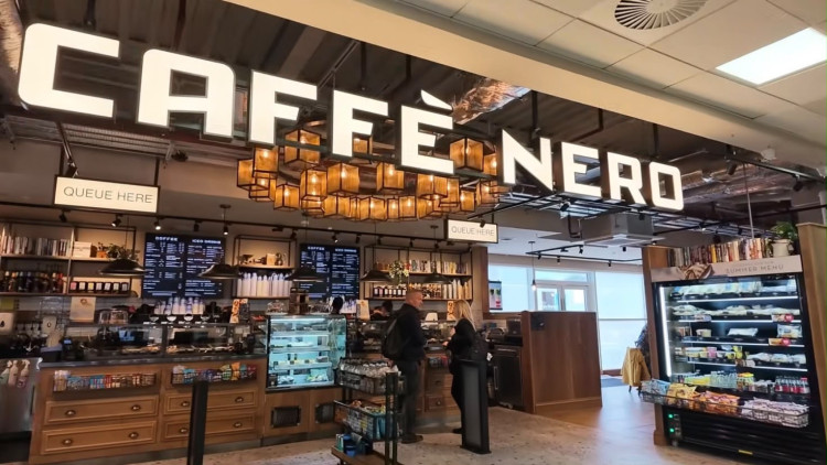 The new café features expanded indoor seating alongside an outdoor seating area (Image via Birmingham Airport) 