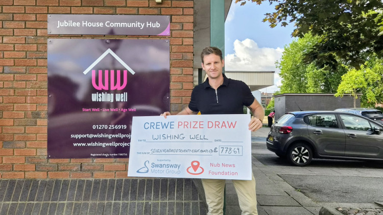 CEO of The Wishing Well, Charles Maines, with the £778.69 Crewe Prize Draw donation (Photo: Nub News).