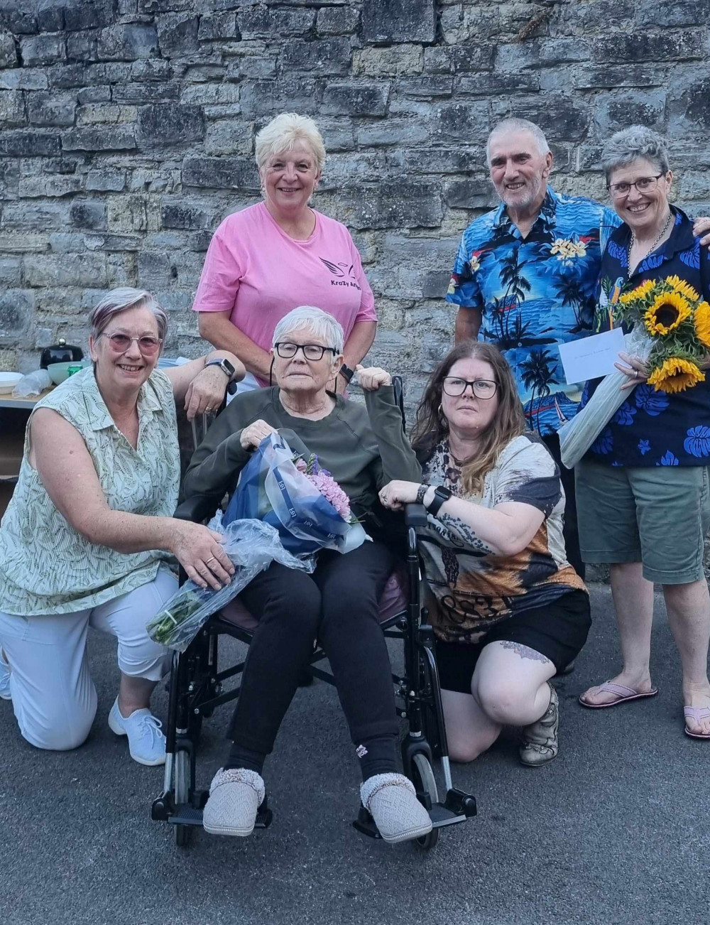 Ann Barclay (RHS) with the cheque, with (L-R) Dawn Wall, Sally Earle, Pat Palmer (seated), Paula Welch and Pat's husband Michael Palmer_04/08/26
