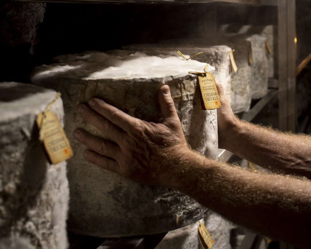 Wookey Hole Cave-Aged Cheddar is marking 20 years underground in Somerset after being named Champion Cheddar at the 2026 awards.