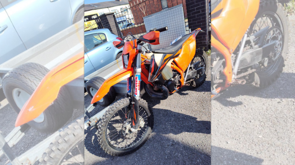 Police seized this orange off-road bike on Saturday 11 July - it was being driven anti-socially around Reddish and Lancashire Hill (Image - GMP)