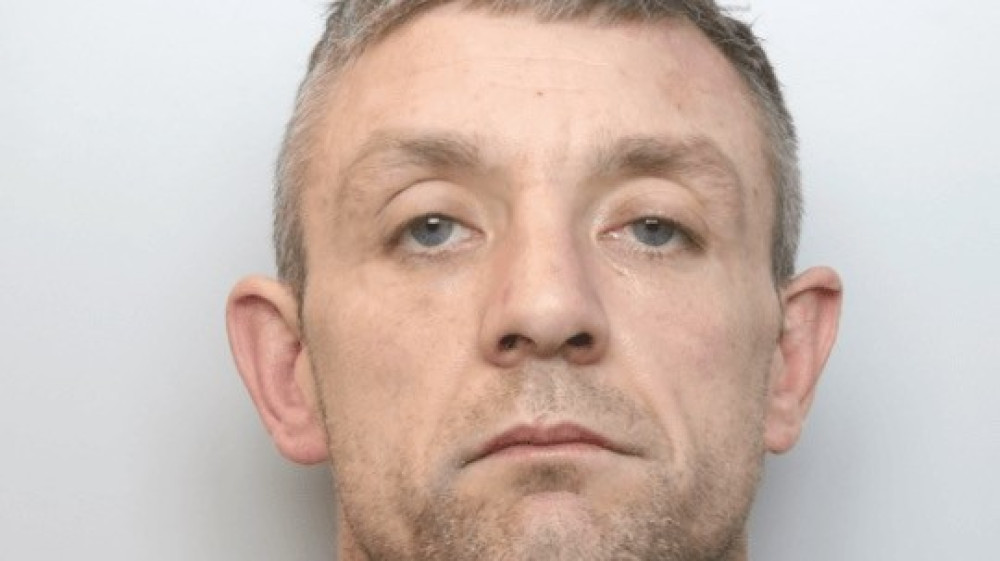 Johnathan Williams, 38, is wanted in connection to a burglary in Crewe (Photo: Cheshire Police).