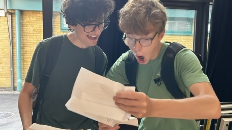 Christ's School's Zac F-I (left) and Oliver C celebrating their A-Level results (credit: Image supplied).