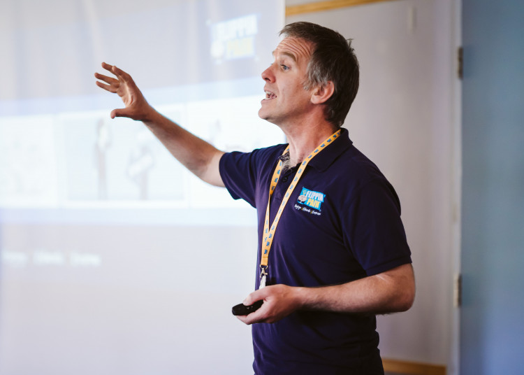 Flippin' Pain's Cormac Ryan Presenting Pain Science Education
