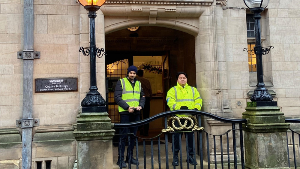Security guards posted at the main entrance to County Buildings in Stafford (image via Phil Corrigan)
