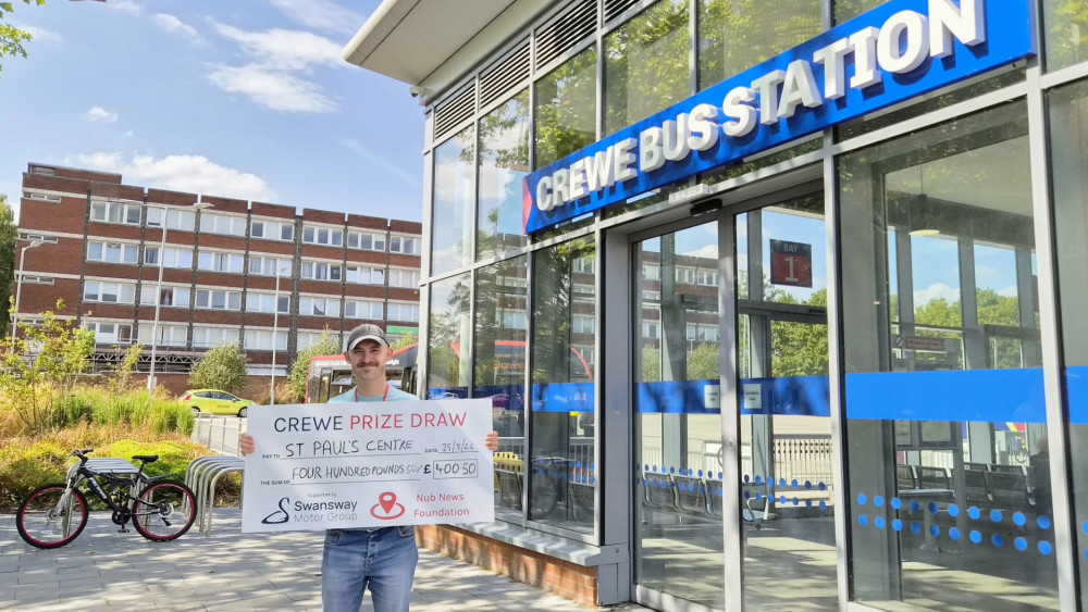 CEO of St Paul's Centre, Jen Chalmers, with the £400.50 Crewe Prize Draw donation (Photo: Ryan Parker).