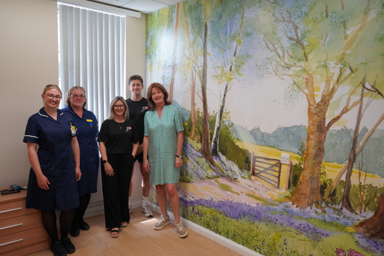 Staff from the maternity ward with Mandy Ogden, Josh Ogden and Allie Pottinger (Credit: ECNHST)