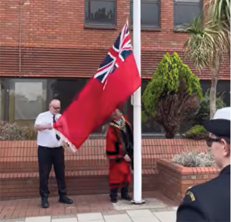 The Mayor raised the Red Ensign.