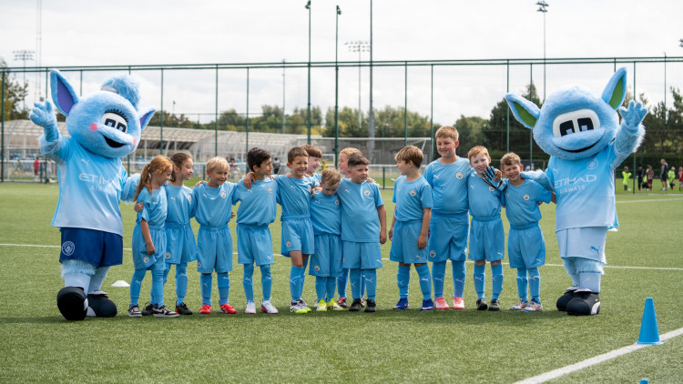 Boys and girls from the Stockport Dynamos under-eights team won a trip to the Manchester City training academy (Image supplied)