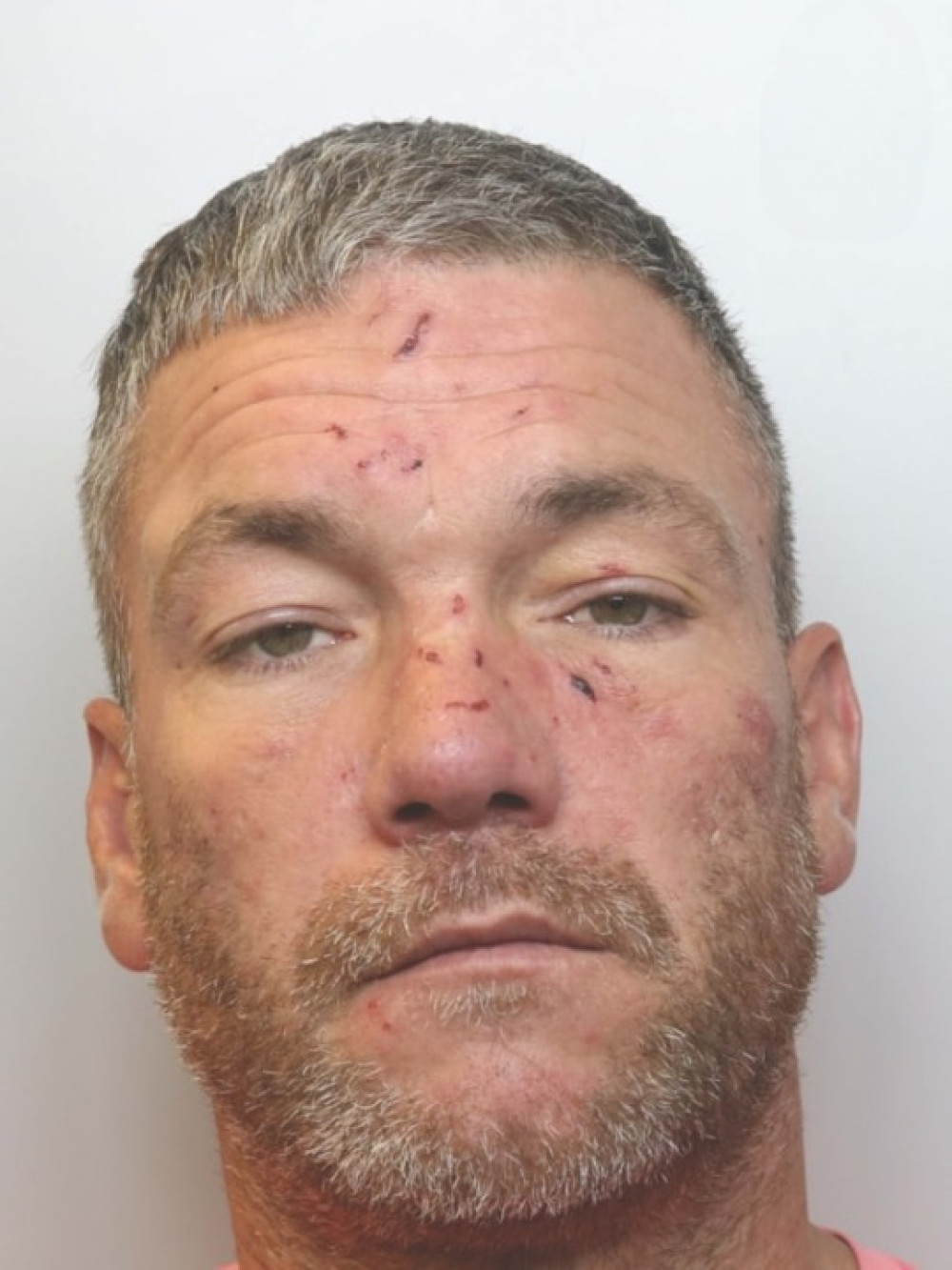 Jon Scragg, 41, is wanted in relation to failing to appear at court (Photo: Cheshire Police).