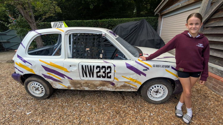 Twelve-year-old Isla Fern with her converted Nissan Micra which she uses for Autograss racing. (Photo: Nub News)