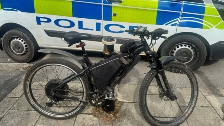 An illegal electric bike has been taken off the streets, following an incident in Woodley Precinct (Image - GMP)