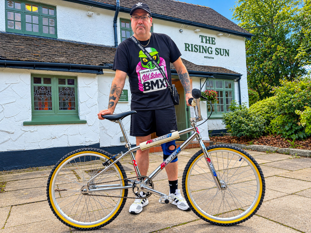 Co-organiser, John Collins, with his bespoke JC Robinson Pro 24-inch cruise outside The Rising Sun (Photo: Jonathan White).