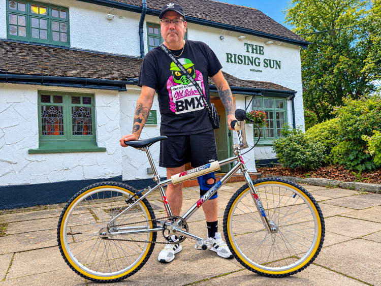 Co-organiser, John Collins, with his bespoke JC Robinson Pro 24-inch cruise outside The Rising Sun (Photo: Jonathan White).