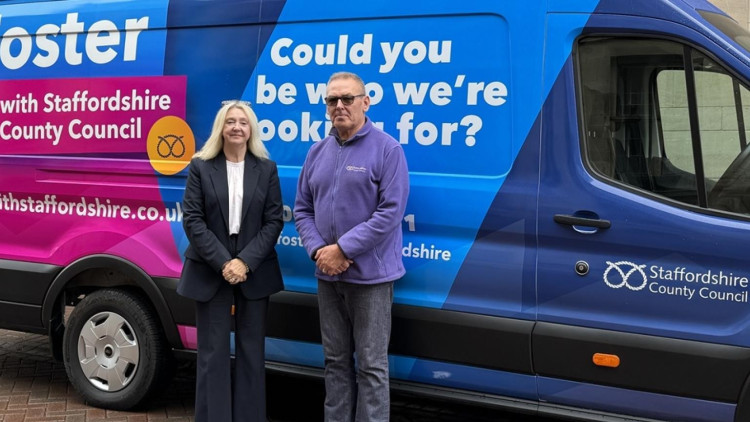 Cllr Su Beardmore and foster carer Marc Heemsbergen in front of the county council fostering van (image via Staffordshire County Council)