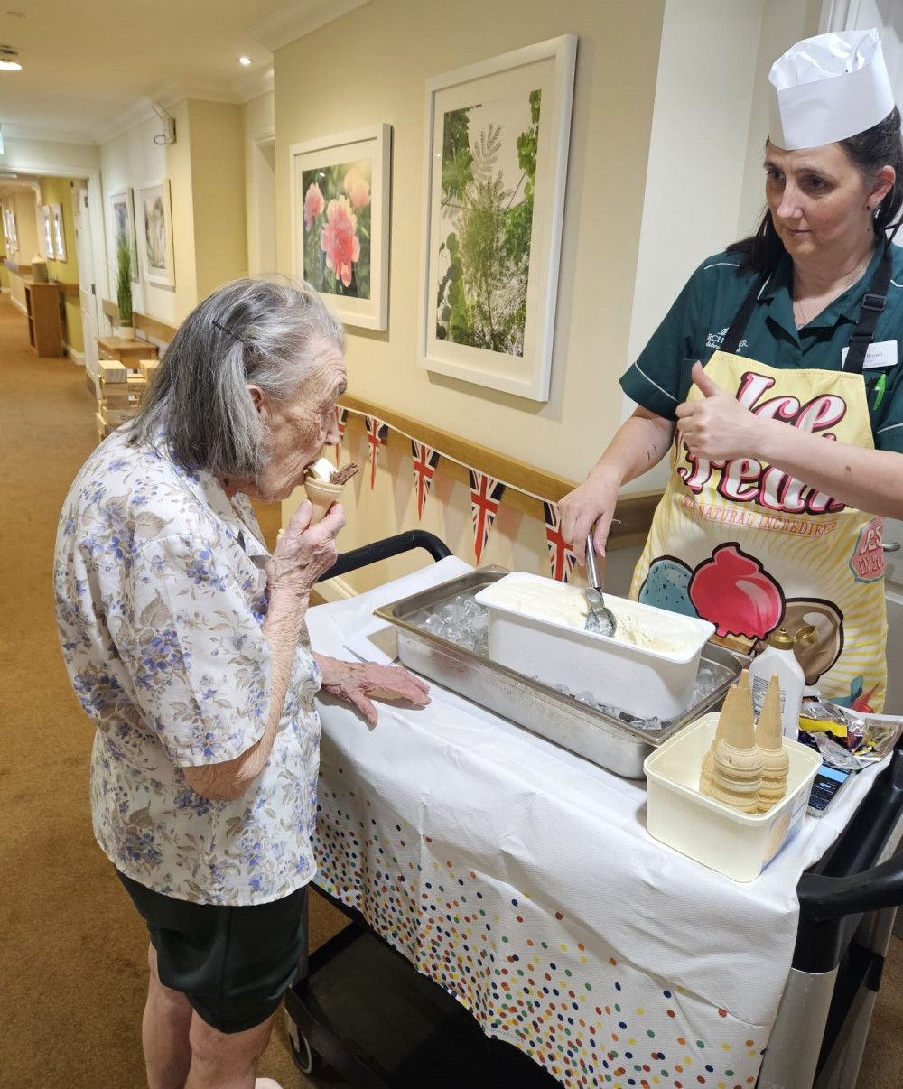 Crandon Springs Dementia Care Champion, Liza, served up ice cream and fun from her ice cream trolly during the vintage seaside experience organised for the home’s Memory Lane community