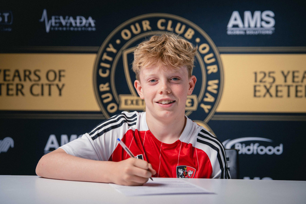 Street pupil Maverick Murphy signs for Exeter City U13s (supplied) 
