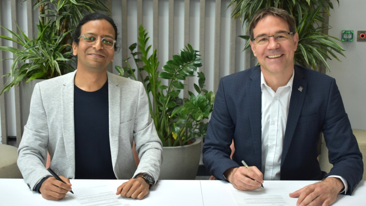 Tejas Kusurkar, Co-Founder of Offgrid Energy Labs, with Professor Raphael Hirschi, Director of Keele’s Digital Society Institute (image via Keele)