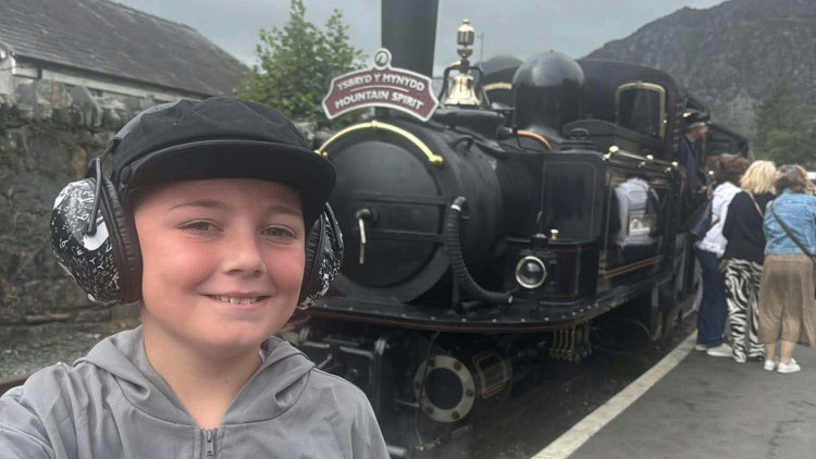 A 10-year-old train enthusiast is visiting Stockport railway station as part of a huge challenge to raise money for Crewe Heritage Centre (Photo: Megan Bailey).