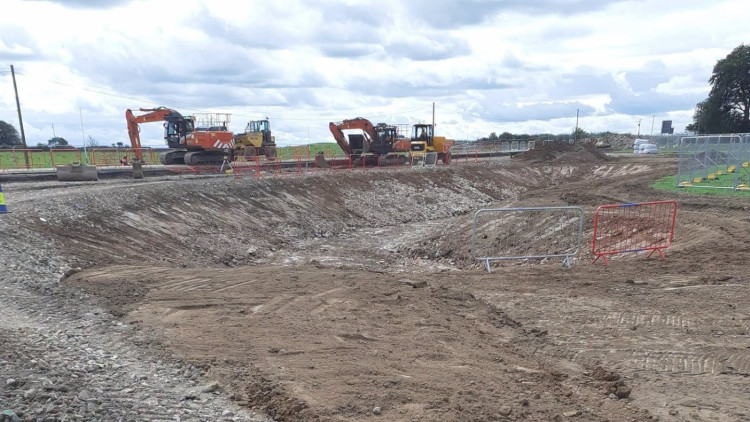 Somerset Council says the £4m Whitnell Corner road safety scheme near Wells remains on schedule to open by mid-December.