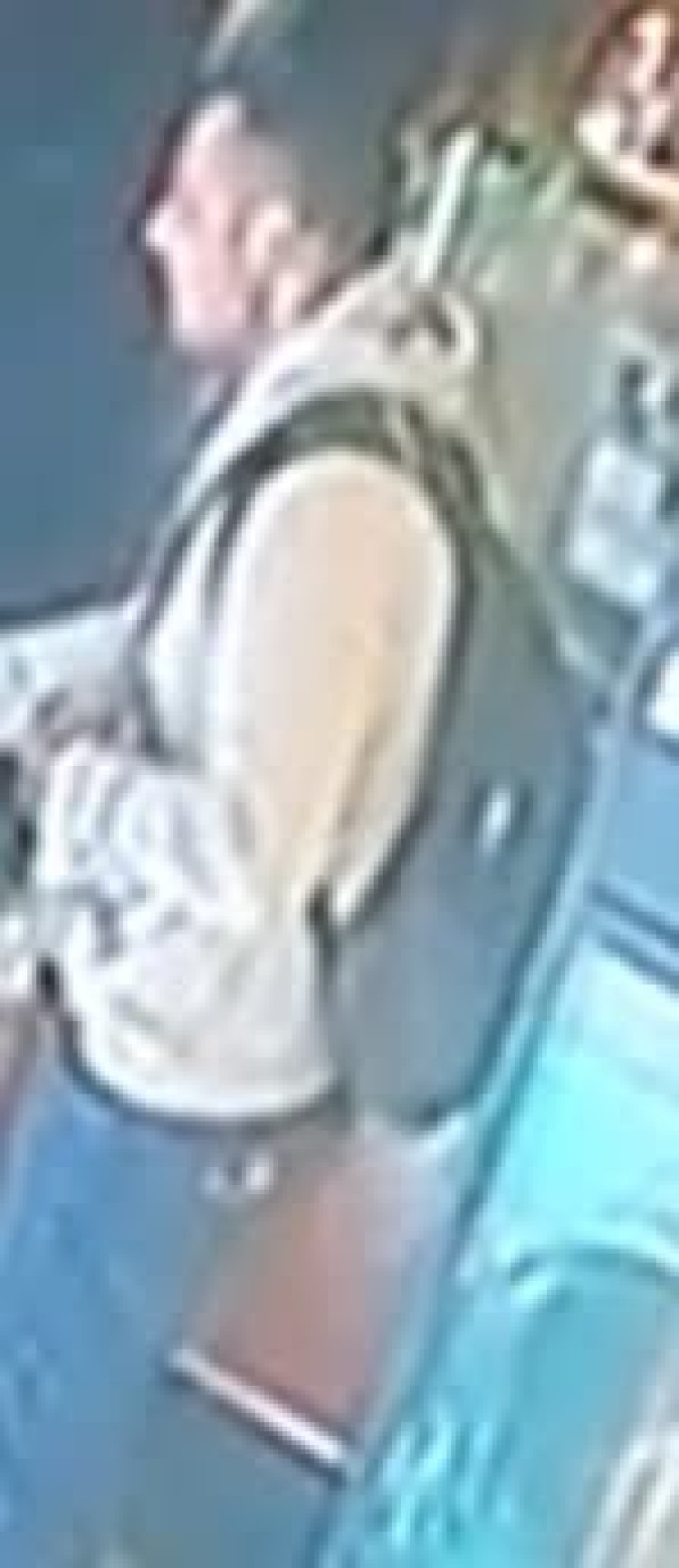 Officers have released an image of a man they believe was in the café at the time of the incident.