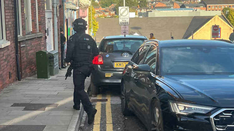 Armed officers were spotted on Queen Victoria Street in Macclesfield (Credit: Supplied)