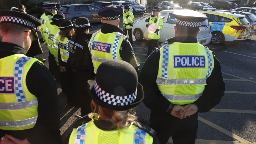Eight men and one youth have been charged following 'football-related disorder' at a Stockport fixture which took place in 2023 (Image - GMP)