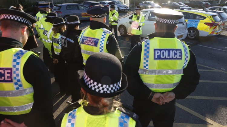 Eight men and one youth have been charged following 'football-related disorder' at a Stockport fixture which took place in 2023 (Image - GMP)