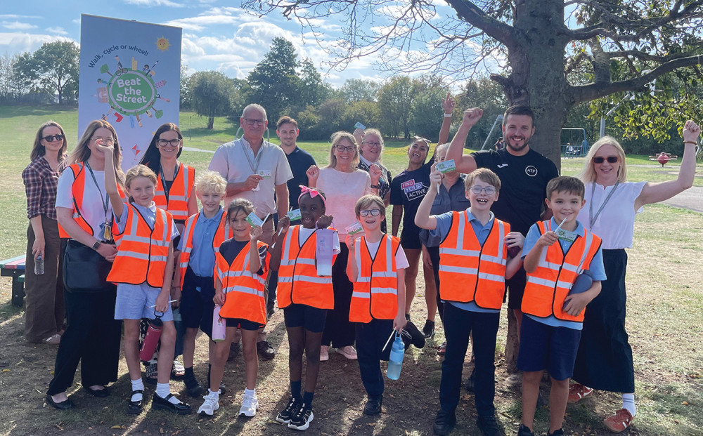 Pupils with Thurrock Council staff, partner organisations and Cllr Mark Turner (centre), at the launch event at Hardie Park Café in Stanford-le-Hope