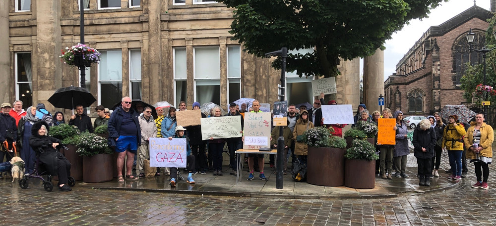 Global Justice Macclesfield will stage another silent vigil outside Macclesfield Town Hall on Saturday, September 26 (Credit: Supplied)