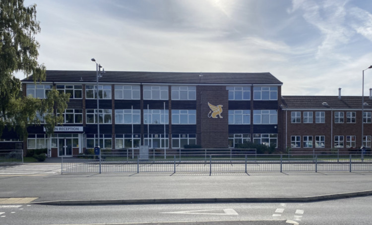 Three arrested after car driven at teacher outside Aylesford School in Warwick this morning (24 September) (image via Nub News)